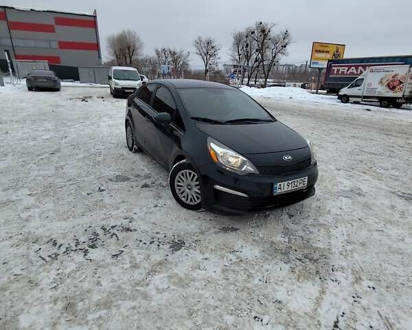 Черный Киа Рио, объемом двигателя 1.6 л и пробегом 180 тыс. км за 8799 $, фото 1 на Automoto.ua