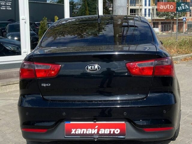 Чорний Кіа Ріо, об'ємом двигуна 1.4 л та пробігом 80 тис. км за 12300 $, фото 1 на Automoto.ua