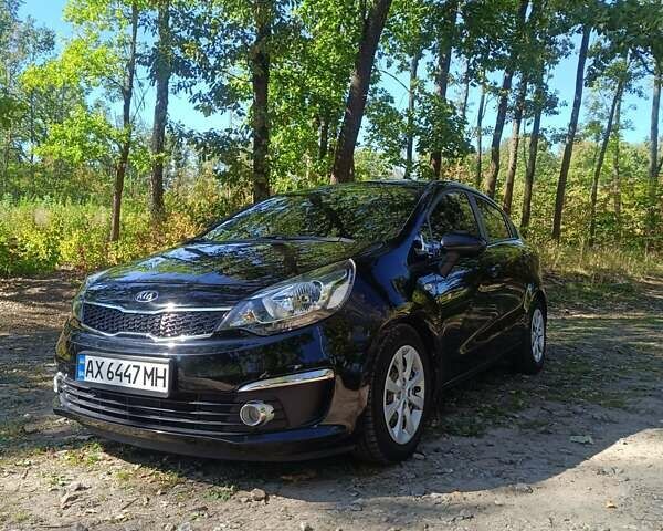 Чорний Кіа Ріо, об'ємом двигуна 1.4 л та пробігом 85 тис. км за 12500 $, фото 1 на Automoto.ua