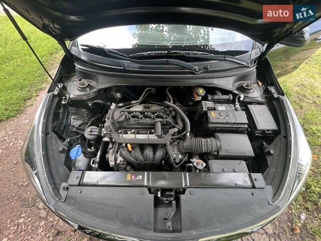 Черный Киа Рио, объемом двигателя 1.37 л и пробегом 32 тыс. км за 12400 $, фото 1 на Automoto.ua
