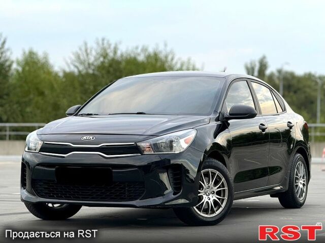 Черный Киа Рио, объемом двигателя 16 л и пробегом 128 тыс. км за 11900 $, фото 1 на Automoto.ua