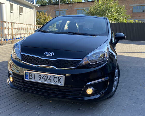 Черный Киа Рио, объемом двигателя 1.4 л и пробегом 14 тыс. км за 11999 $, фото 1 на Automoto.ua