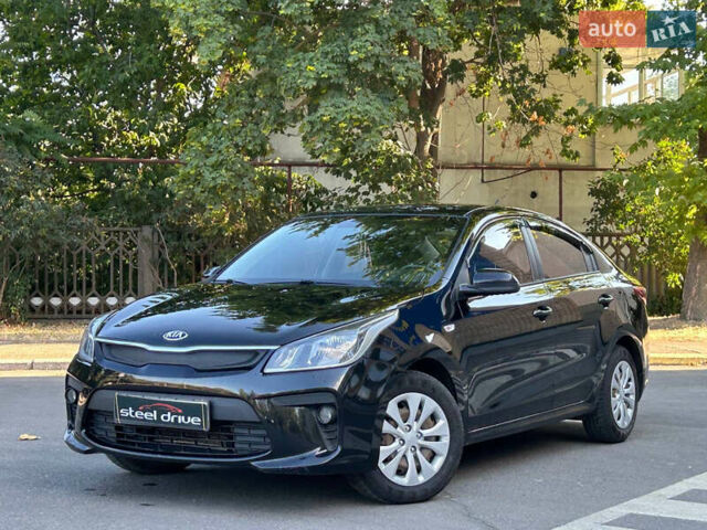 Черный Киа Рио, объемом двигателя 1.37 л и пробегом 127 тыс. км за 11899 $, фото 1 на Automoto.ua