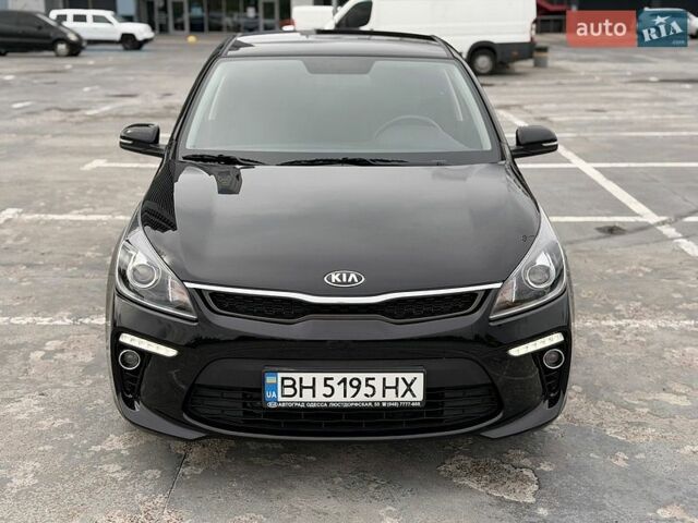 Черный Киа Рио, объемом двигателя 1.6 л и пробегом 31 тыс. км за 14500 $, фото 1 на Automoto.ua