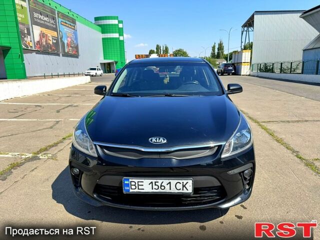 Чорний Кіа Ріо, об'ємом двигуна 1.4 л та пробігом 145 тис. км за 11500 $, фото 1 на Automoto.ua