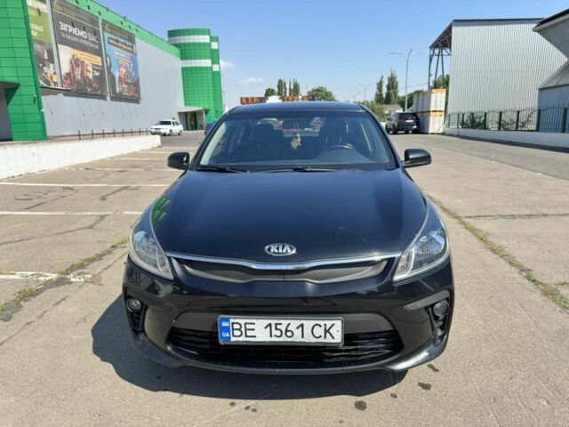 Чорний Кіа Ріо, об'ємом двигуна 1 л та пробігом 156 тис. км за 11028 $, фото 1 на Automoto.ua