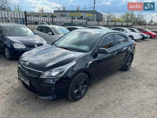 Черный Киа Рио, объемом двигателя 1.37 л и пробегом 145 тыс. км за 12500 $, фото 1 на Automoto.ua