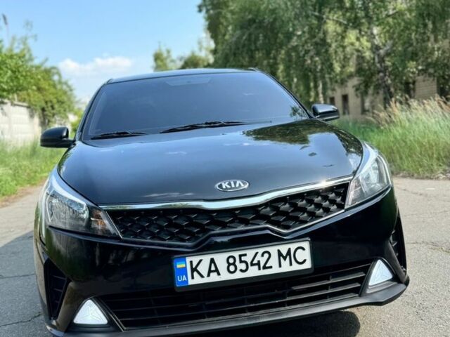 Черный Киа Рио, объемом двигателя 1.4 л и пробегом 24 тыс. км за 12800 $, фото 1 на Automoto.ua