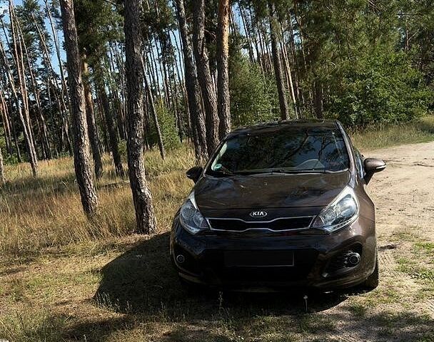 Коричневый Киа Рио, объемом двигателя 1.4 л и пробегом 180 тыс. км за 8500 $, фото 1 на Automoto.ua