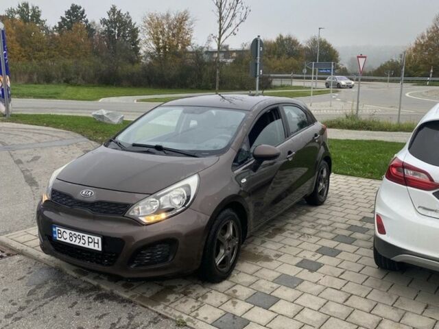 Коричневий Кіа Ріо, об'ємом двигуна 1.1 л та пробігом 234 тис. км за 6100 $, фото 1 на Automoto.ua
