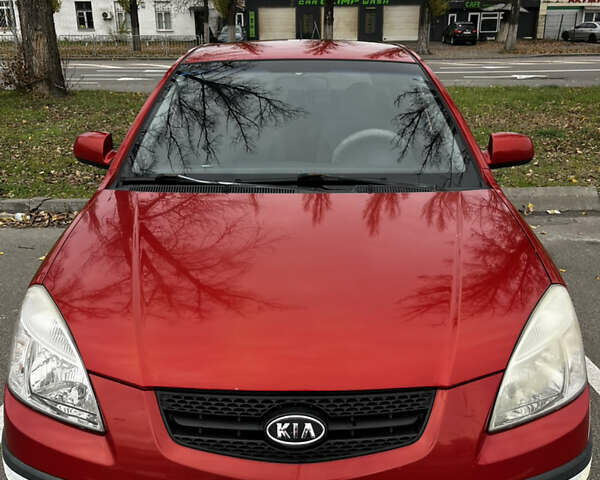 Красный Киа Рио, объемом двигателя 1.4 л и пробегом 187 тыс. км за 6000 $, фото 1 на Automoto.ua