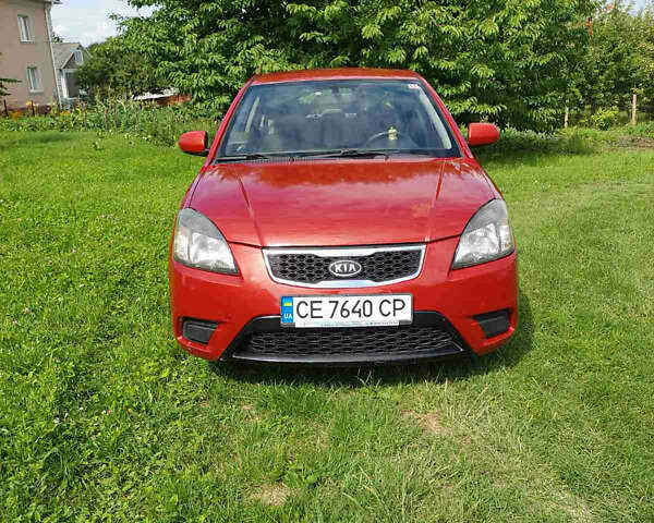 Красный Киа Рио, объемом двигателя 1.4 л и пробегом 195 тыс. км за 6234 $, фото 1 на Automoto.ua