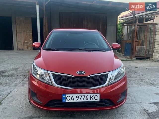 Красный Киа Рио, объемом двигателя 1.4 л и пробегом 123 тыс. км за 8300 $, фото 1 на Automoto.ua