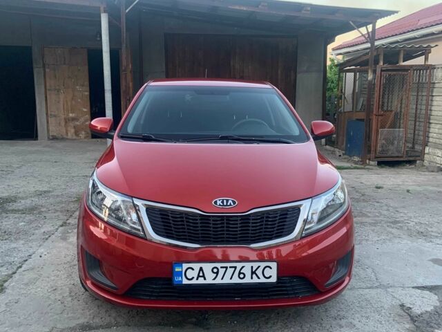 Красный Киа Рио, объемом двигателя 1.4 л и пробегом 123 тыс. км за 8308 $, фото 1 на Automoto.ua