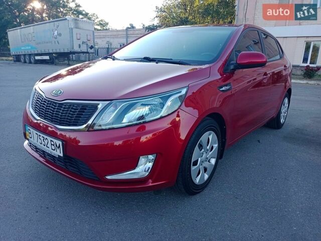 Красный Киа Рио, объемом двигателя 1.6 л и пробегом 28 тыс. км за 10650 $, фото 1 на Automoto.ua