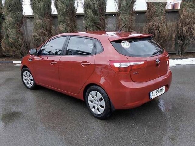 Красный Киа Рио, объемом двигателя 1.4 л и пробегом 181 тыс. км за 6800 $, фото 1 на Automoto.ua