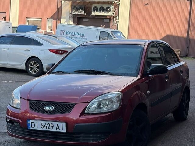 Червоний Кіа Ріо, об'ємом двигуна 1.4 л та пробігом 243 тис. км за 3400 $, фото 1 на Automoto.ua