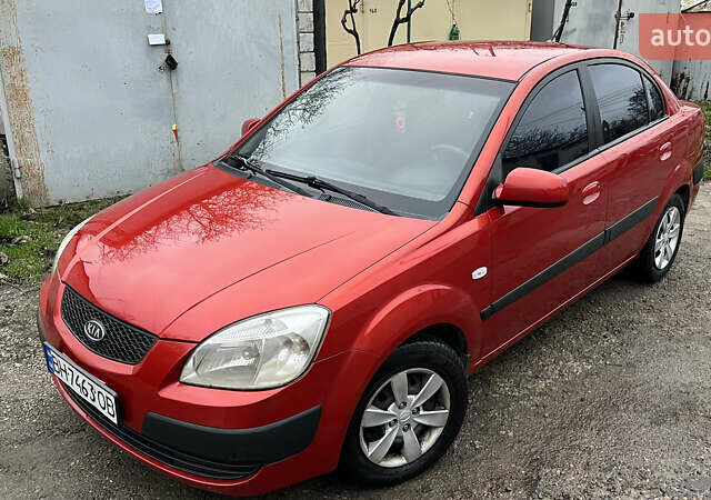 Красный Киа Рио, объемом двигателя 1.49 л и пробегом 198 тыс. км за 3999 $, фото 1 на Automoto.ua