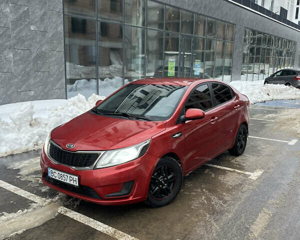 Красный Киа Рио, объемом двигателя 1.4 л и пробегом 212 тыс. км за 6000 $, фото 1 на Automoto.ua