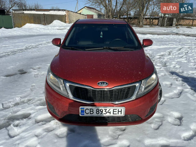 Червоний Кіа Ріо, об'ємом двигуна 1.4 л та пробігом 170 тис. км за 4500 $, фото 1 на Automoto.ua