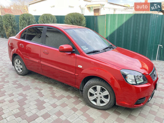Червоний Кіа Ріо, об'ємом двигуна 1.4 л та пробігом 46 тис. км за 6200 $, фото 1 на Automoto.ua