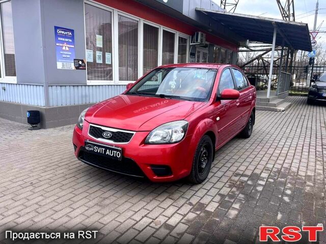 Красный Киа Рио, объемом двигателя 1.4 л и пробегом 113 тыс. км за 5899 $, фото 1 на Automoto.ua