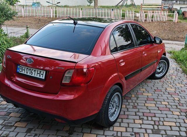Червоний Кіа Ріо, об'ємом двигуна 1.4 л та пробігом 208 тис. км за 3950 $, фото 1 на Automoto.ua