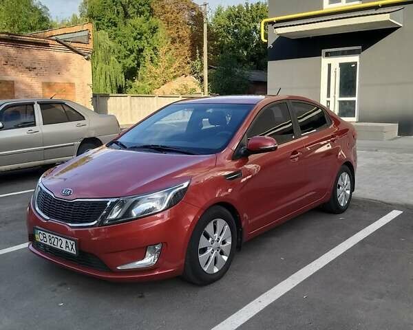 Красный Киа Рио, объемом двигателя 1.6 л и пробегом 120 тыс. км за 9200 $, фото 1 на Automoto.ua