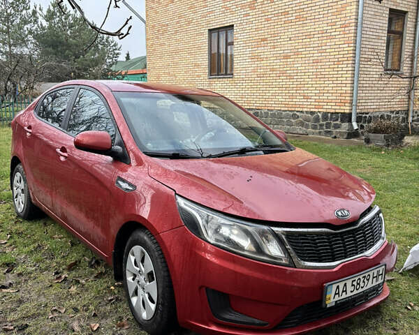 Червоний Кіа Ріо, об'ємом двигуна 1.4 л та пробігом 165 тис. км за 4500 $, фото 1 на Automoto.ua