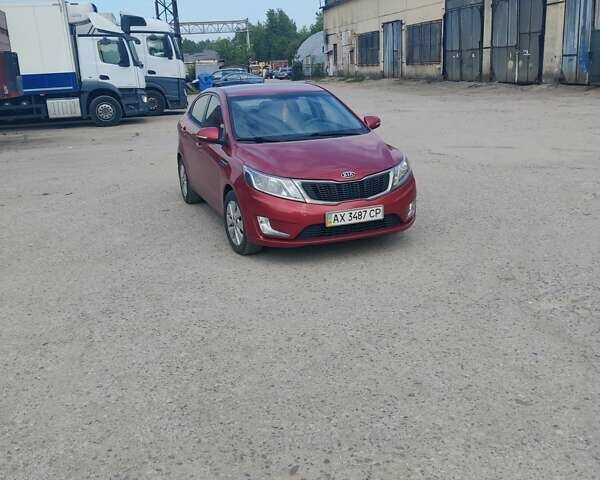 Красный Киа Рио, объемом двигателя 1.6 л и пробегом 94 тыс. км за 8200 $, фото 1 на Automoto.ua