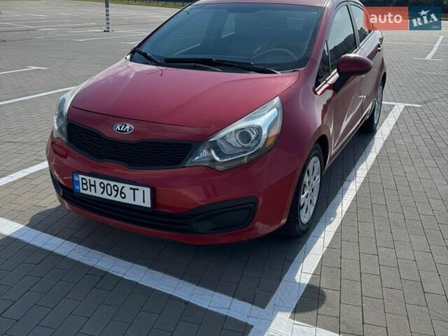 Красный Киа Рио, объемом двигателя 1.59 л и пробегом 223 тыс. км за 5999 $, фото 1 на Automoto.ua