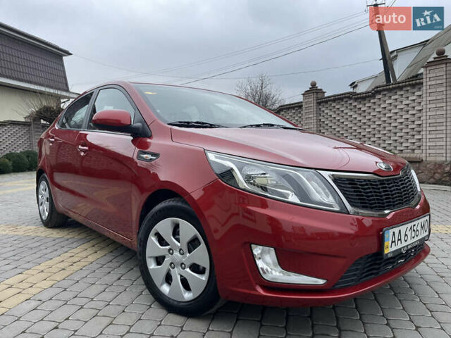 Красный Киа Рио, объемом двигателя 1.6 л и пробегом 113 тыс. км за 9300 $, фото 1 на Automoto.ua