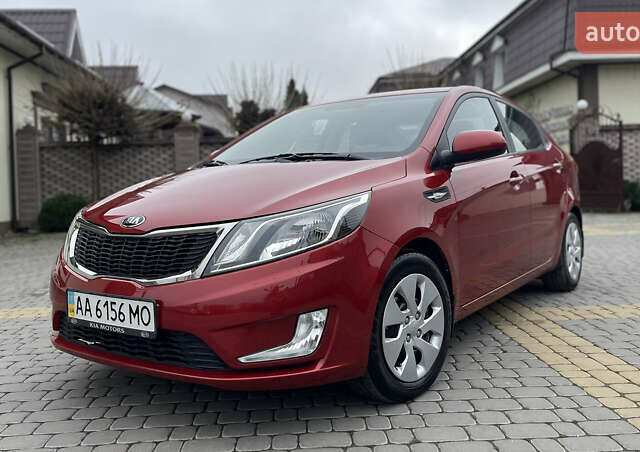 Красный Киа Рио, объемом двигателя 1.59 л и пробегом 113 тыс. км за 9700 $, фото 1 на Automoto.ua