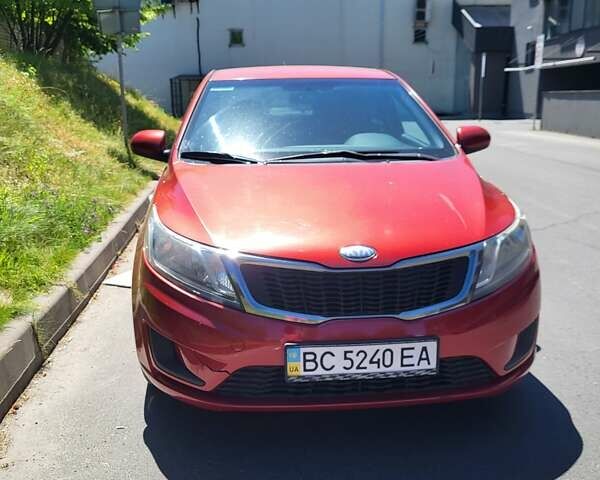 Красный Киа Рио, объемом двигателя 1.4 л и пробегом 126 тыс. км за 7900 $, фото 1 на Automoto.ua