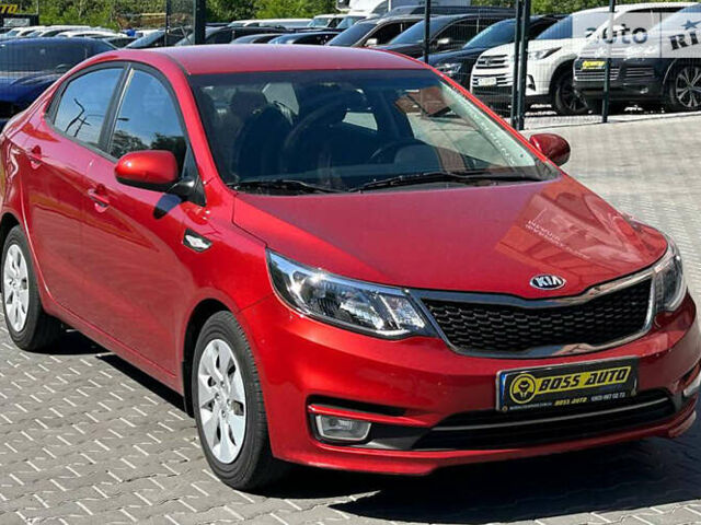 Червоний Кіа Ріо, об'ємом двигуна 1.4 л та пробігом 35 тис. км за 12800 $, фото 1 на Automoto.ua