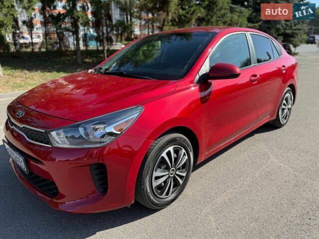 Красный Киа Рио, объемом двигателя 1.59 л и пробегом 150 тыс. км за 10495 $, фото 1 на Automoto.ua