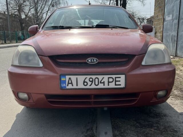 Красный Киа Рио, объемом двигателя 1.5 л и пробегом 380 тыс. км за 2150 $, фото 1 на Automoto.ua
