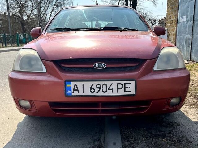 Красный Киа Рио, объемом двигателя 1.5 л и пробегом 380 тыс. км за 2150 $, фото 1 на Automoto.ua