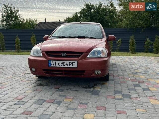 Красный Киа Рио, объемом двигателя 1.49 л и пробегом 380 тыс. км за 2000 $, фото 1 на Automoto.ua