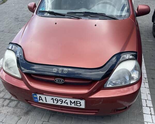 Червоний Кіа Ріо, об'ємом двигуна 1.5 л та пробігом 202 тис. км за 3200 $, фото 1 на Automoto.ua
