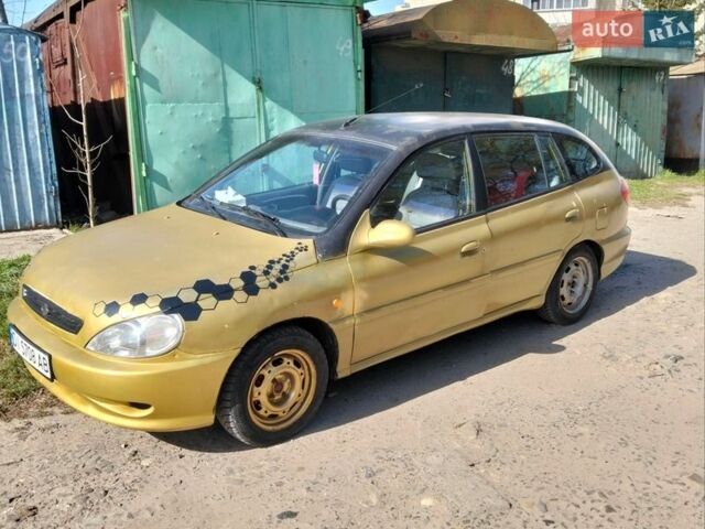 Желтый Киа Рио, объемом двигателя 1.5 л и пробегом 147 тыс. км за 1800 $, фото 1 на Automoto.ua