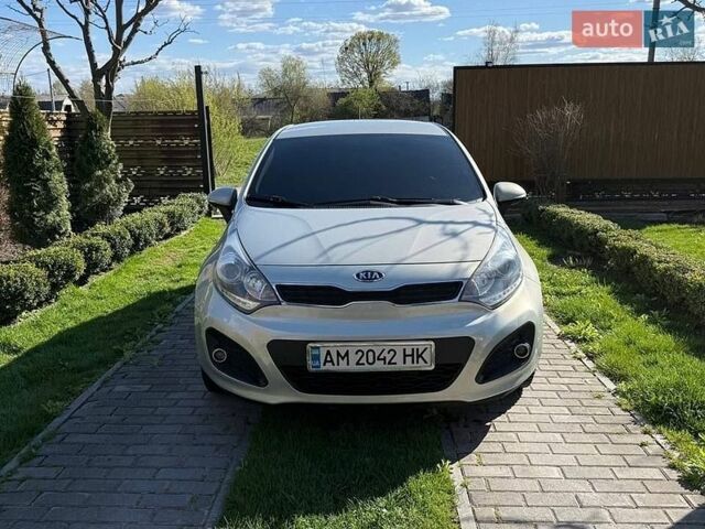 Серый Киа Рио, объемом двигателя 1.12 л и пробегом 220 тыс. км за 5700 $, фото 1 на Automoto.ua