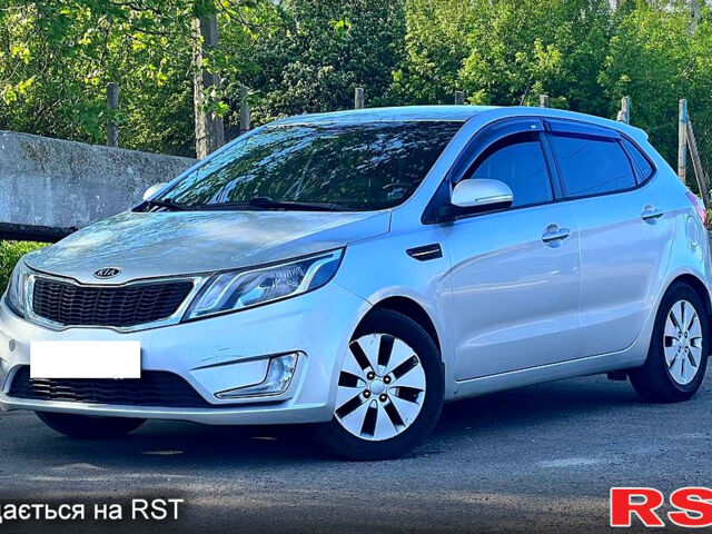 Серый Киа Рио, объемом двигателя 1.6 л и пробегом 173 тыс. км за 7500 $, фото 1 на Automoto.ua