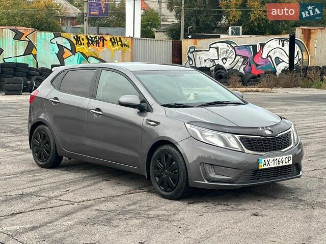 Сірий Кіа Ріо, об'ємом двигуна 1.4 л та пробігом 205 тис. км за 4900 $, фото 1 на Automoto.ua