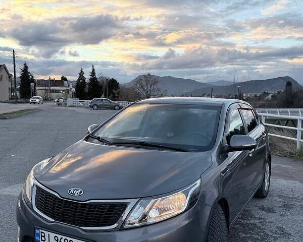 Серый Киа Рио, объемом двигателя 1.6 л и пробегом 104 тыс. км за 8000 $, фото 1 на Automoto.ua