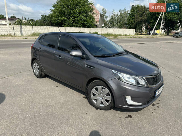 Сірий Кіа Ріо, об'ємом двигуна 1.59 л та пробігом 103 тис. км за 6999 $, фото 1 на Automoto.ua