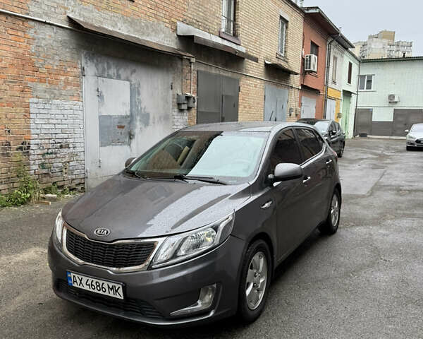 Сірий Кіа Ріо, об'ємом двигуна 1.4 л та пробігом 170 тис. км за 5999 $, фото 1 на Automoto.ua