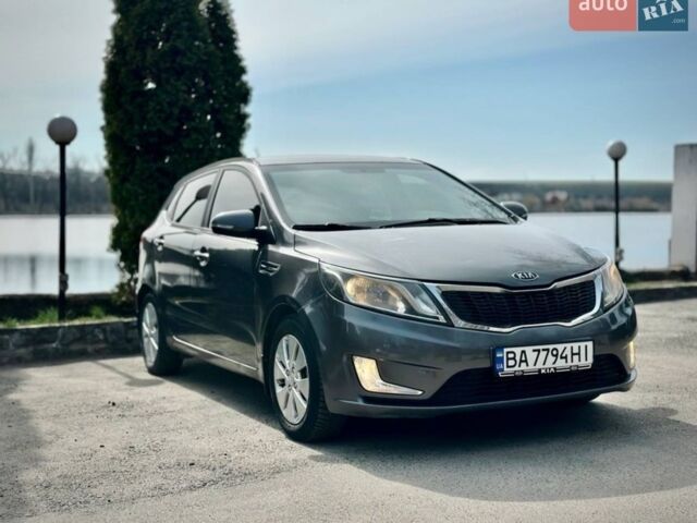 Серый Киа Рио, объемом двигателя 1.6 л и пробегом 150 тыс. км за 7900 $, фото 1 на Automoto.ua