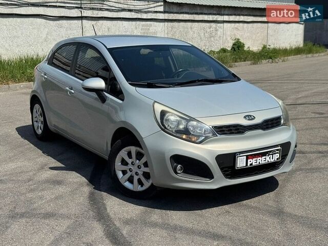 Сірий Кіа Ріо, об'ємом двигуна 1.12 л та пробігом 224 тис. км за 5999 $, фото 1 на Automoto.ua