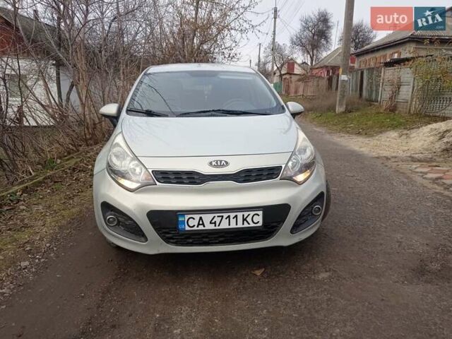 Серый Киа Рио, объемом двигателя 1.12 л и пробегом 212 тыс. км за 5900 $, фото 1 на Automoto.ua